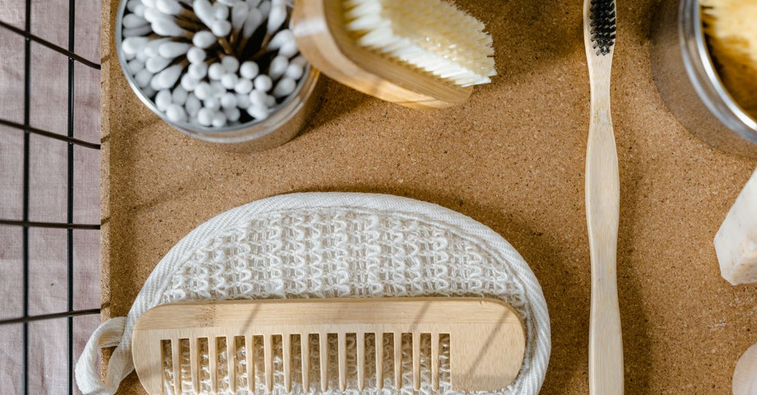 Eco-friendly bamboo cotton swabs in a reusable metal container, essential for a precise cotton swabs buying guide UK.