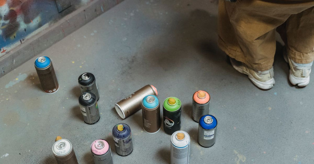Lineup of best hair sprays 2026 bottles on a clean surface, showcasing different hold types and sizes