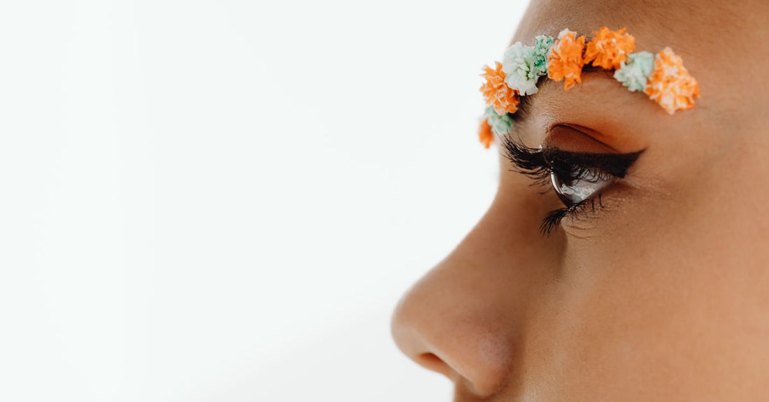 A selection of different false eyelash styles arranged neatly on a white background, illustrating a false lashes buying guide.