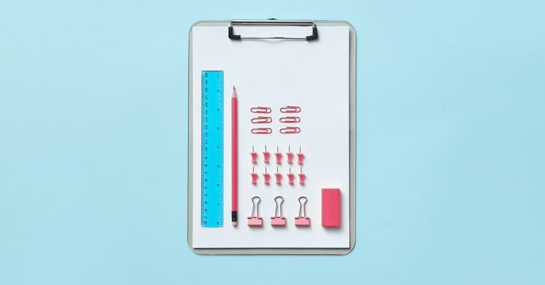 A flatlay of stainless steel blackhead and blemish remover tools on a white background, part of a blackhead & blemish removers buying guide.