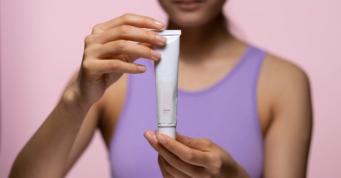 A CC cream tube on a white marble surface, illustrating our CC creams buying guide for UK shoppers.
