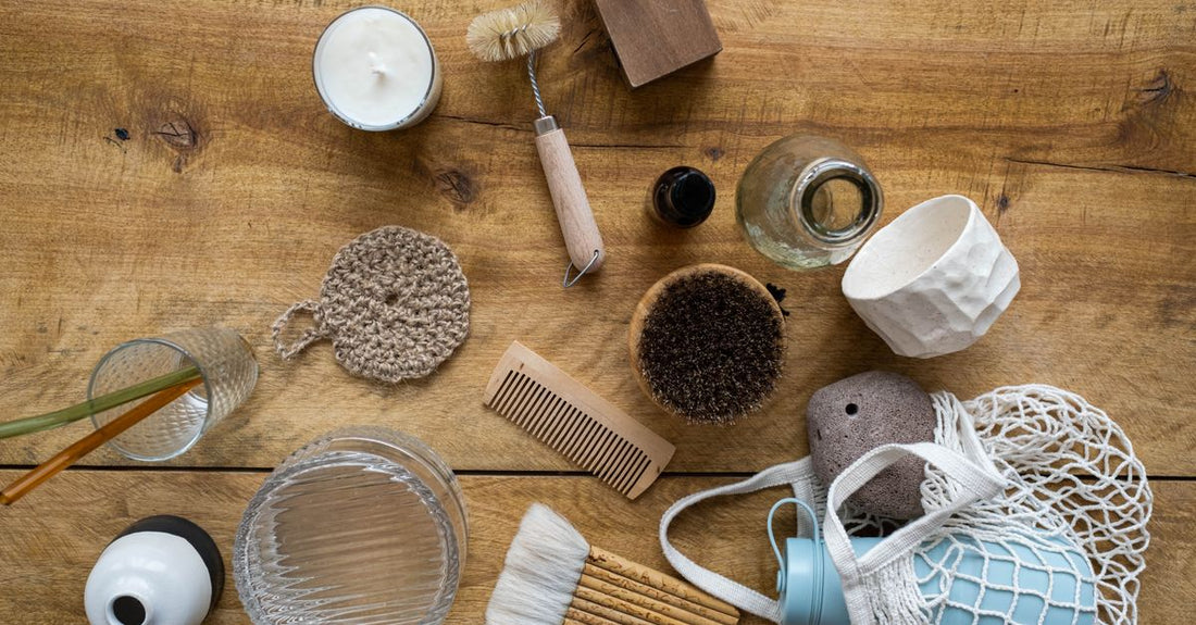 Selection of bamboo and natural bristle bath & body brushes arranged on a light surface, illustrating how to choose bath & body brushes for value.