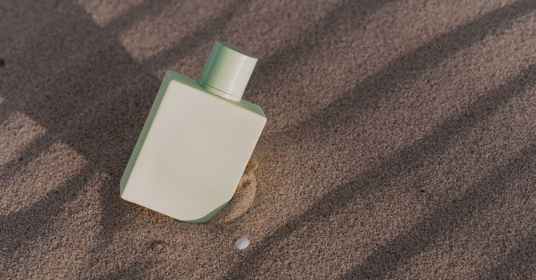Best tanning oil for dark tan UK bottle on sandy beach