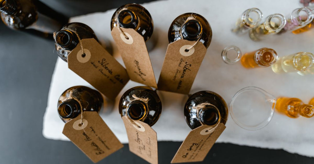 Fragrance buying guide UK featuring perfume bottles on a marble surface