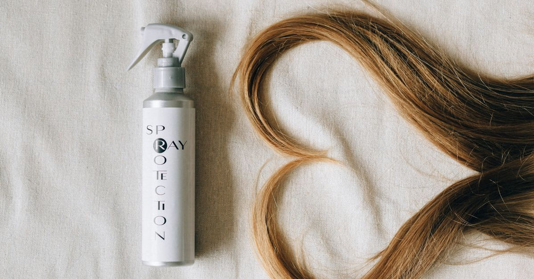 Best leave in conditioner for dry hair UK product bottles on a bathroom shelf