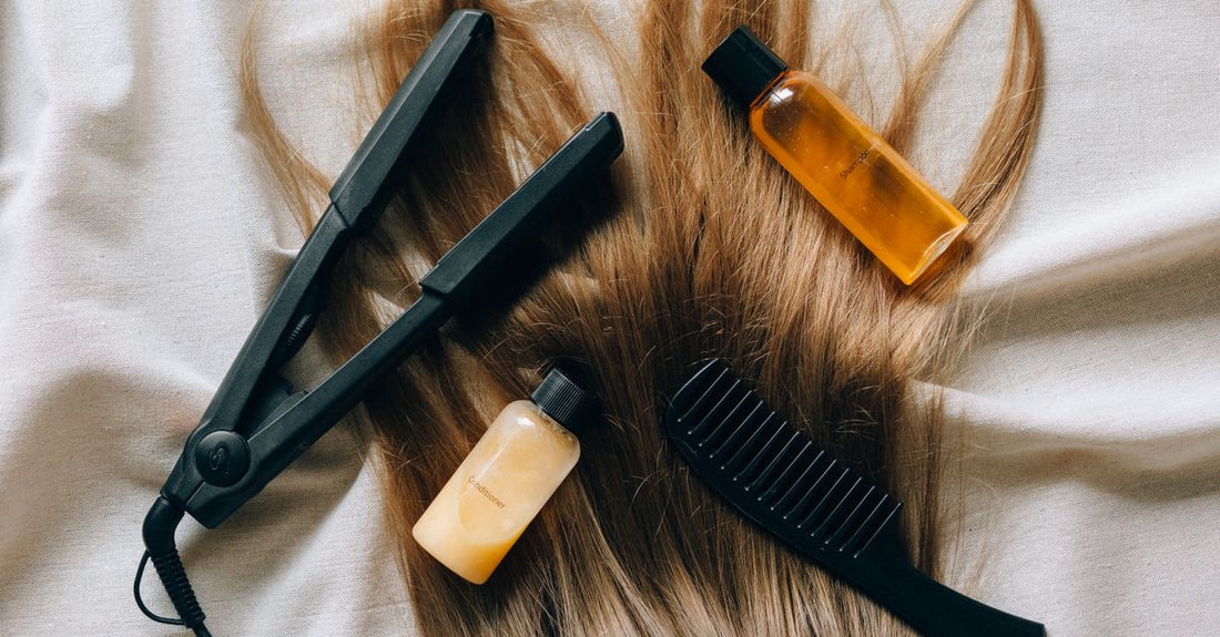 A curated flatlay of conditioner bottles and jars in a bathroom setting, illustrating the best conditioners UK 2026