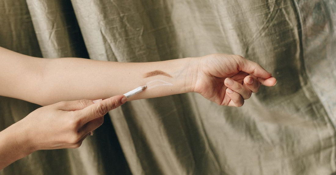An array of best eyebrow color UK 2026 swatches on a clean background, showing warm and cool brown tones for shade matching.