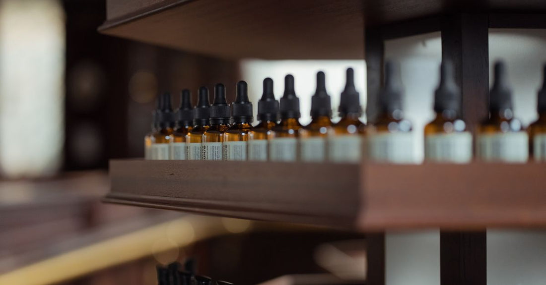 Beard oil bottle with wooden cap on a clean surface, representing the best beard oil for soft beard UK