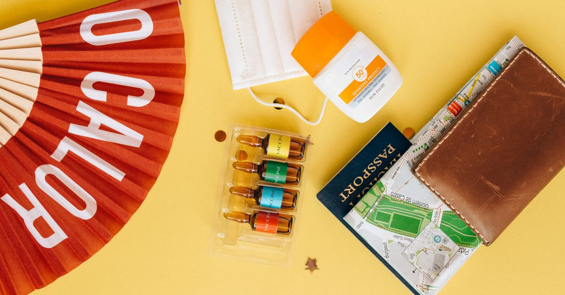 A flatlay of various sun protection products including creams and sprays, illustrating the sun protection buying guide UK.