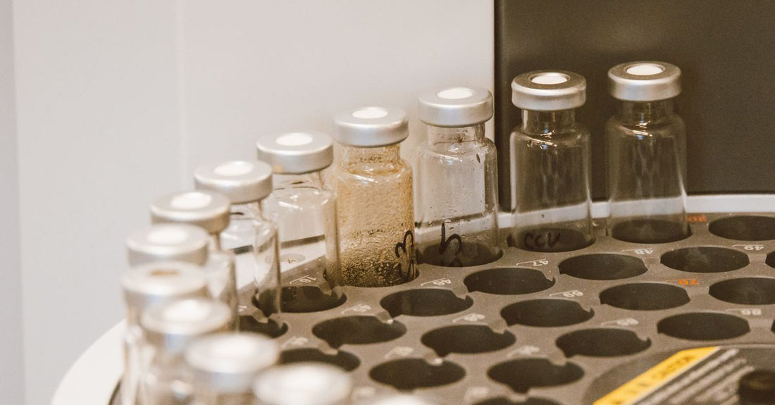 An array of elegant eau de parfum bottles displayed on a marble surface, illustrating how to choose the right scent.
