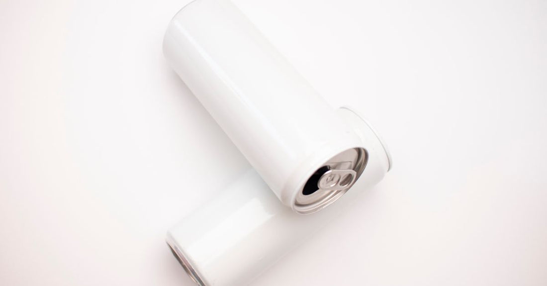 A can of hair styling mousse on a white background, illustrating how to style hair with mousse for volume.