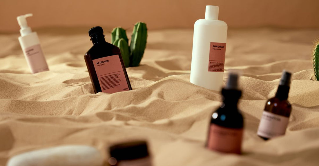 A selection of body sunscreen bottles on a light background, illustrating how to choose body sunscreens UK.