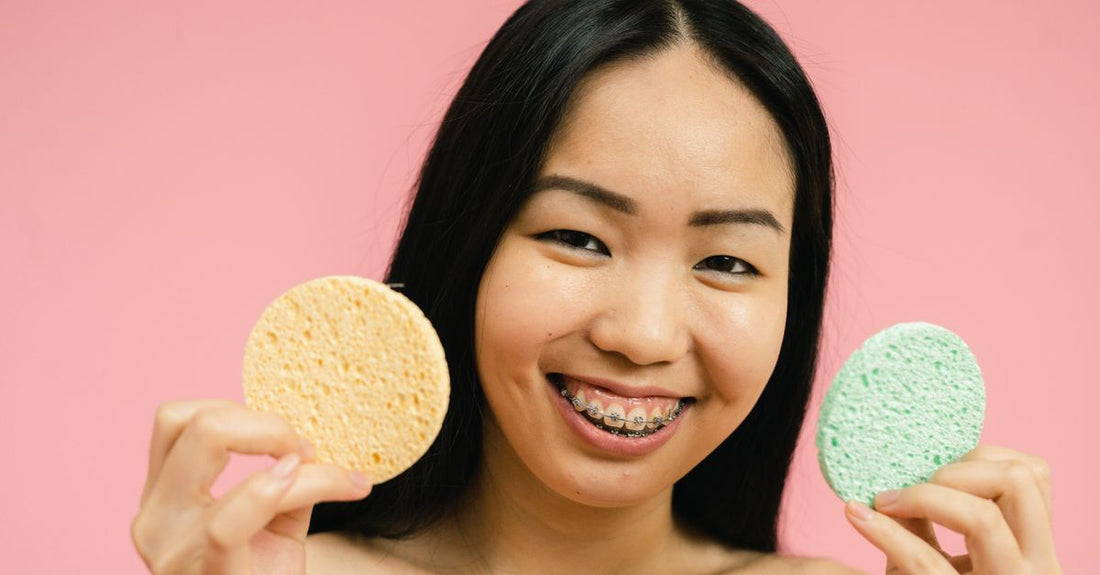 A collection of the best blenders & sponges 2026 arranged on a clean white surface, showcasing various shapes and colours for flawless makeup application.
