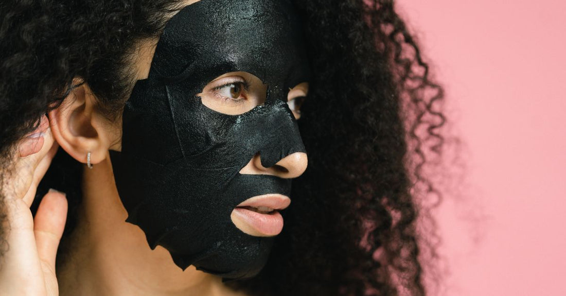 A collection of the best hair masks 2026 on a light background, showcasing jars and tubes of hydrating, repairing, and volumising formulas.