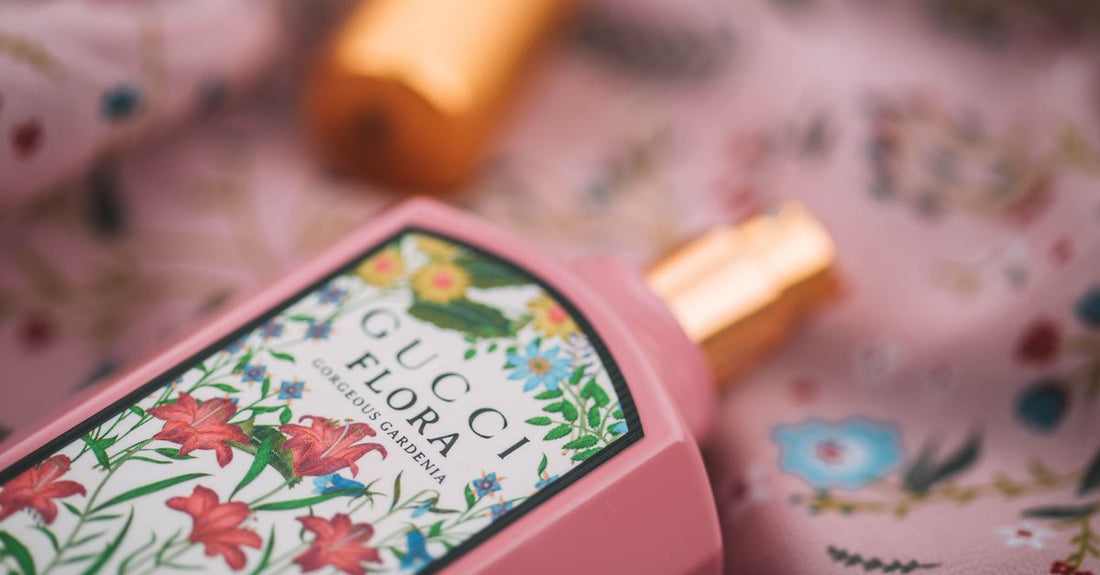 A luxury eau de parfum bottle on a marble surface, illustrating a myth-busting eau de parfum buying guide.