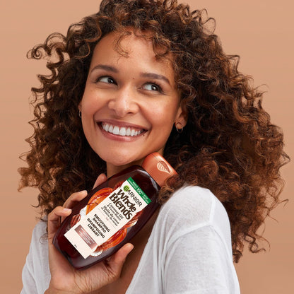 Garnier Whole Blends Smoothing Oil Conditioner with Coconut Oil & Cocoa Butter Extracts, 3.4 Fl Oz