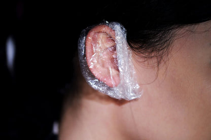 GOUWEIBA 100 Pack Clear Disposable Ear Protectors - Waterproof Ear Cover Caps for Hair Dye, Shower, Bathing, Spa, Salon, Home, Hotel Avelisse