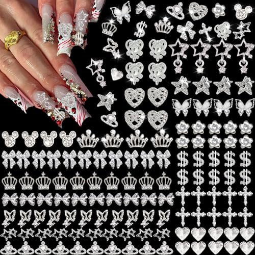KACHIMOO 128 PCS Silver Nail Charms - 3D Butterfly, Bow, Star, Crown, Cross, Dollar, Heart Shapes - Y2K Nail Art Rhinestone Decor Avelisse