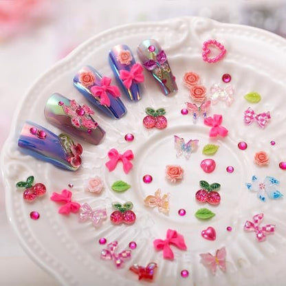 28 Grids Nail Charms Kit with Rhinestones for Nails - 3D Kawaii Bows, Cherry, Flowers, Butterfly, Red Pink Gold Nail Gems, Pearls & Metal Studs - DIY Manicure Art Supplies with Wax Pen & Tweezers