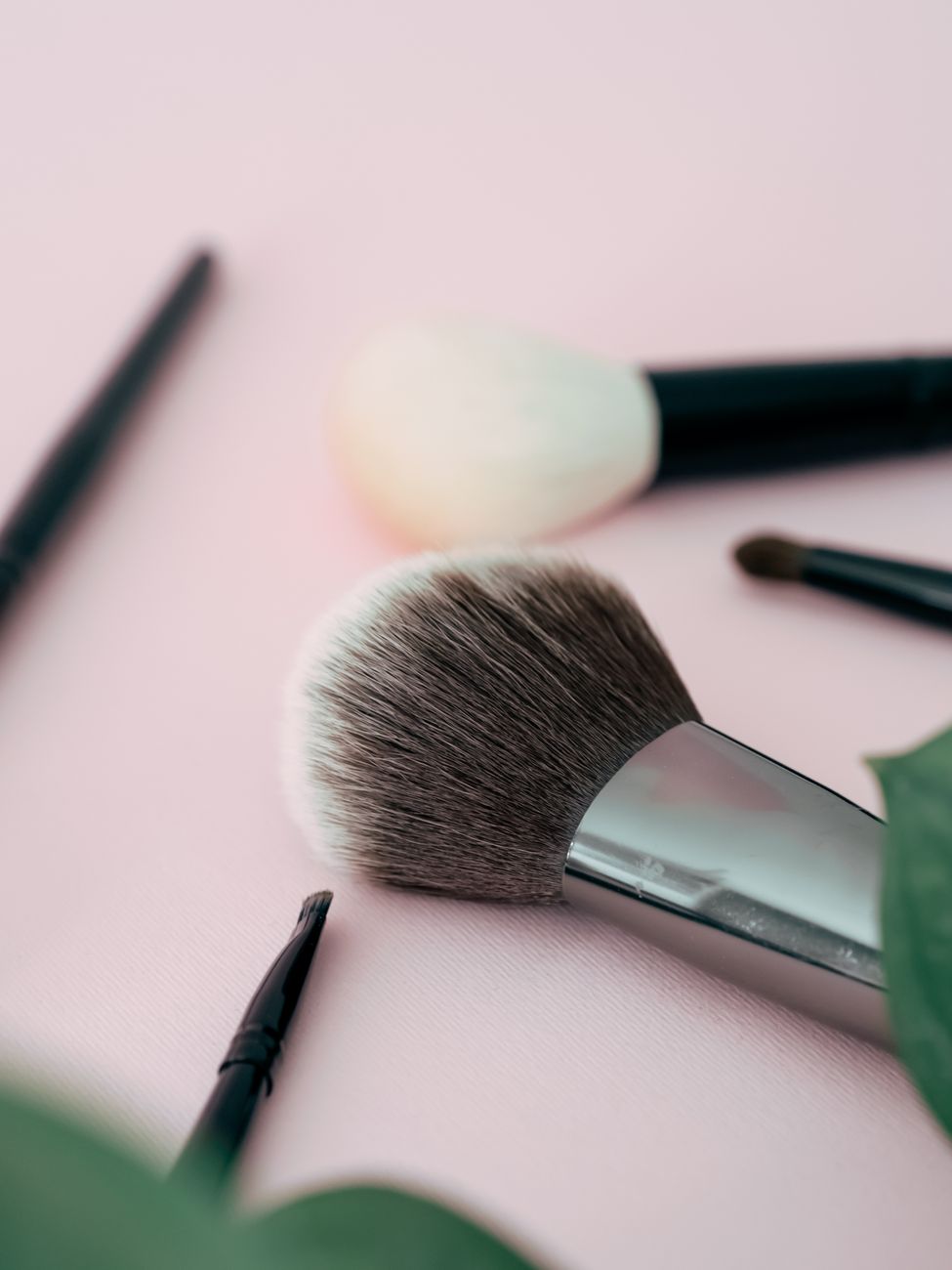 Makeup tools and palette flatlay